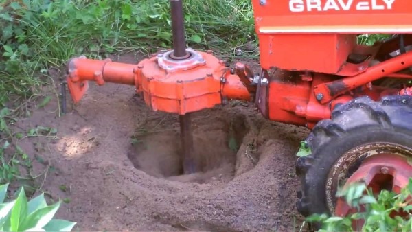 Gravely With Cultivator Attachment Used As A Post Hole Digger