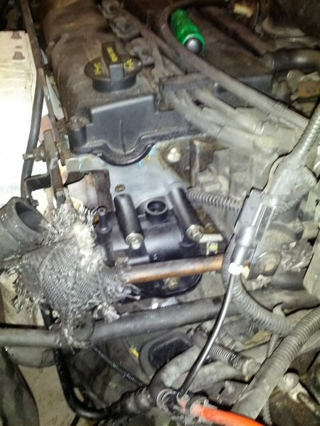 Replace The Thermostat Housing On A 2002 Ford Focus