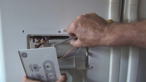 How To Repair A Frozen Ge Refrigerator Water Dispenser
